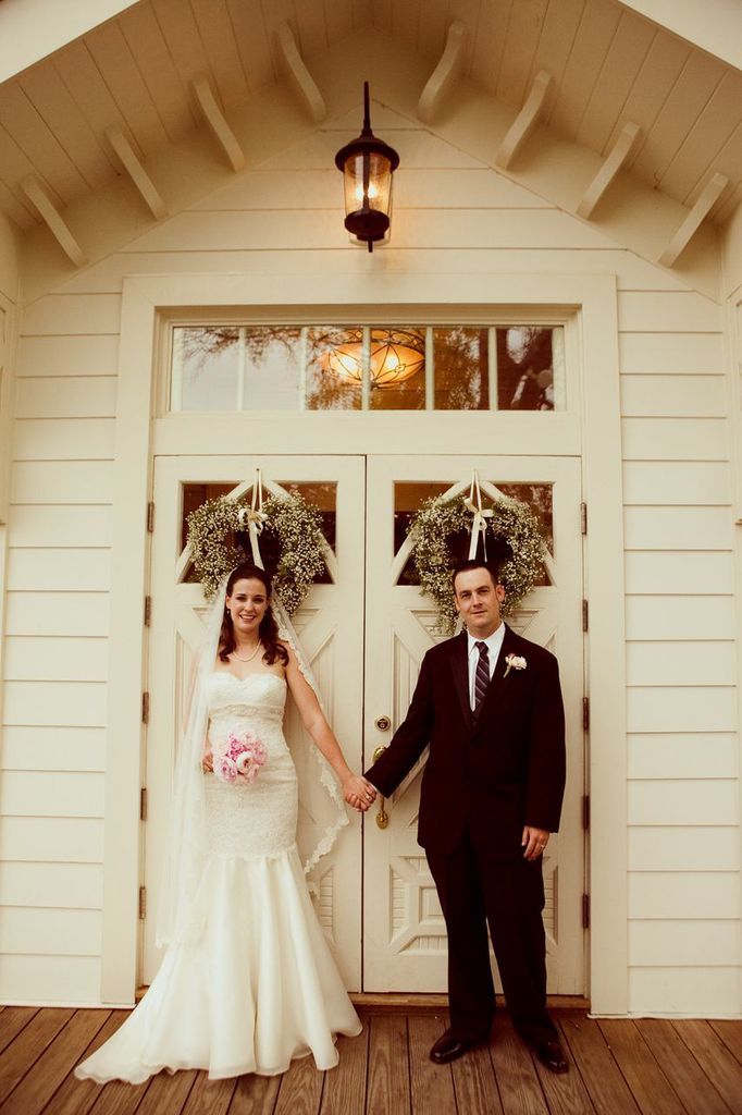 couple in front of chapel